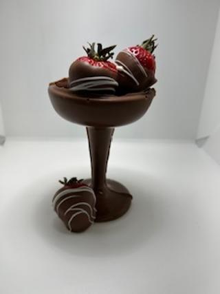 Champaign Glass of Chocolate with Three chocolate dipped Strawberries