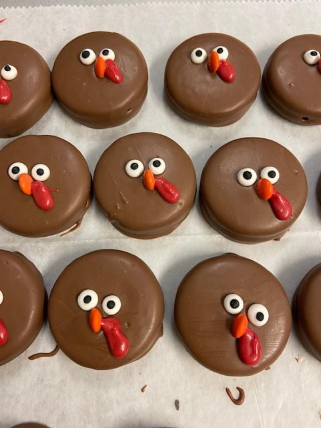 Sandwich cookies dipped in chocolate to look like Turkeys